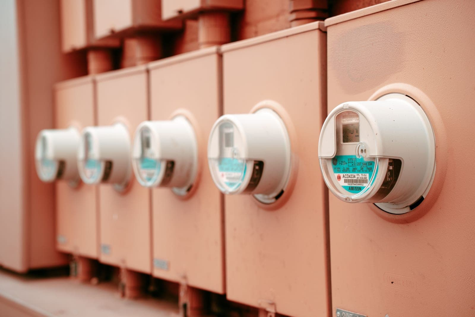 A row of industrial electricity meters for power monitoring