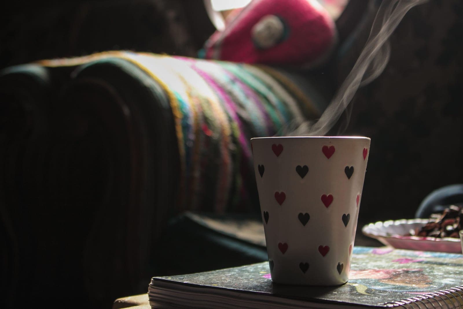 Steam rising from a mug in a warm, quiet room